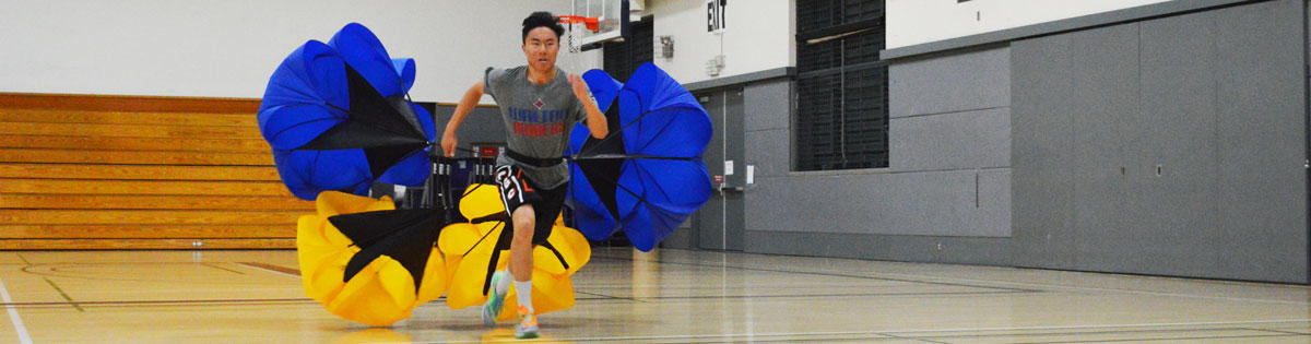 Student pulling a training parachute