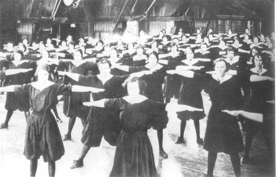 Women’s P.E. class held in the old Hearst Hall, designed by John Maybeck. The building was destroyed by fire in 1922.